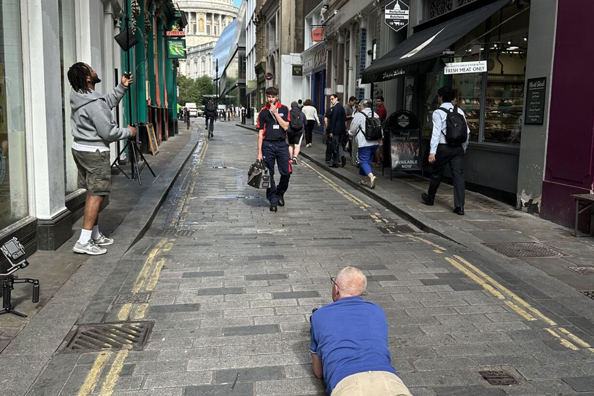 model in the street with St Pauls Catherdral in the background