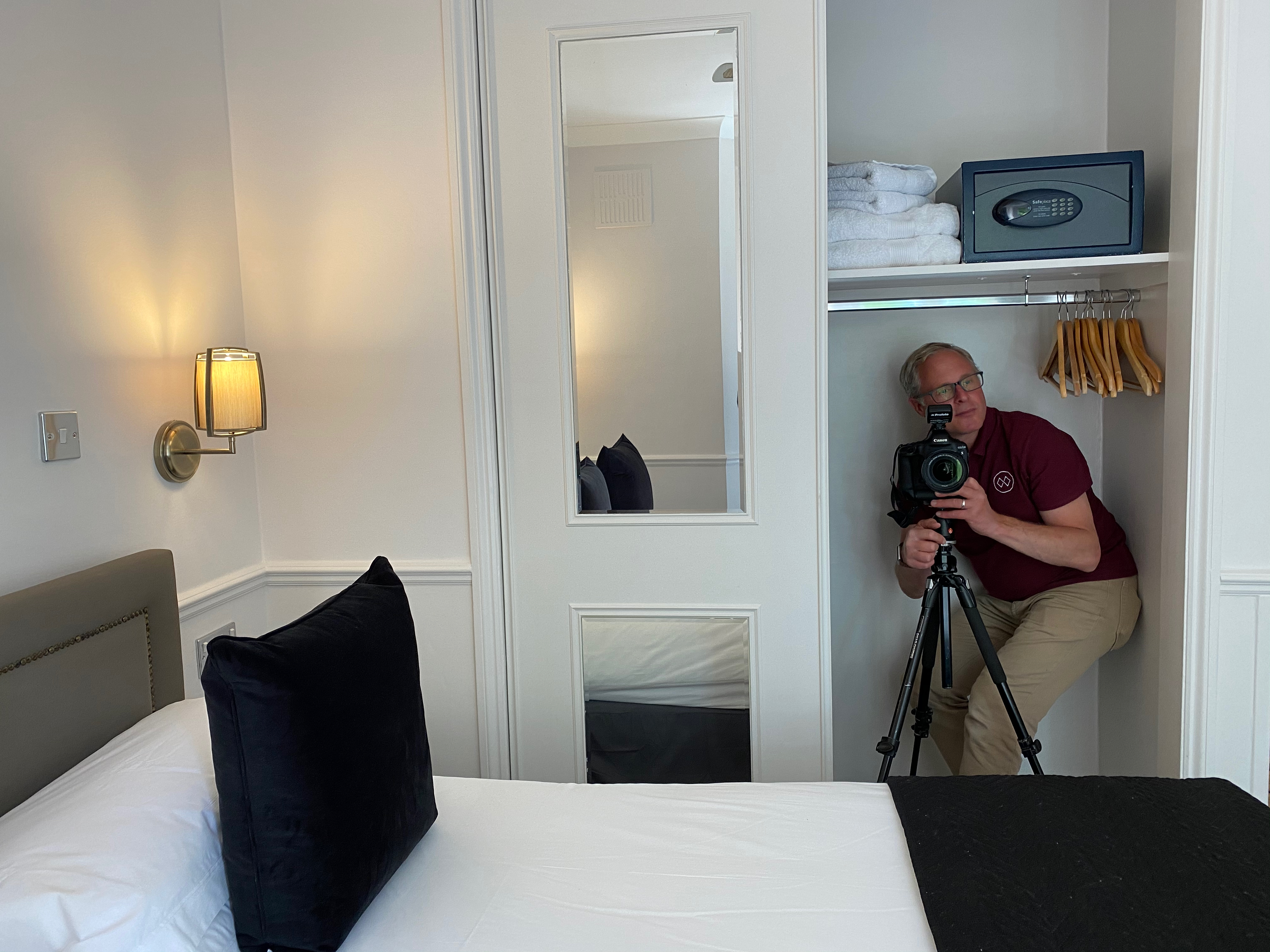 Mark Weeks shooting a virtual tour from within a closet